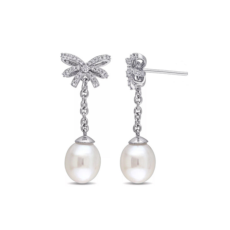 Temperament studded bow earrings Shell Pearl long earrings