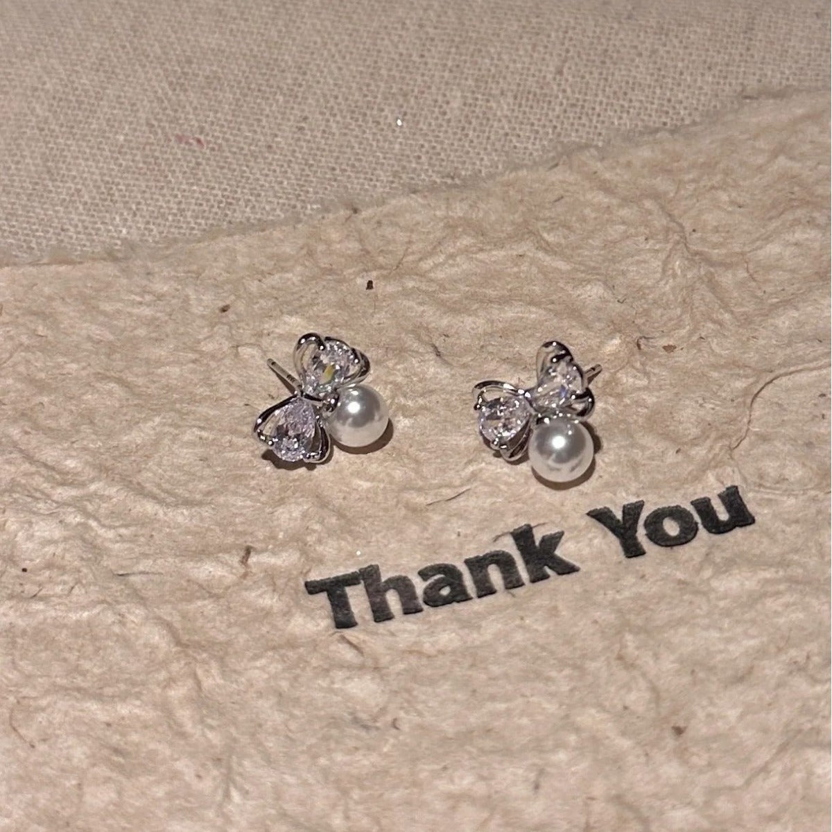 S925 Sterling Silver 2024 New Bowknot Pearl Stud Earrings for Women High-end Elegant Design Earrings