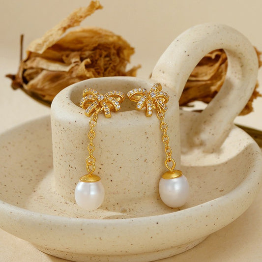 Temperament studded bow earrings Shell Pearl long earrings