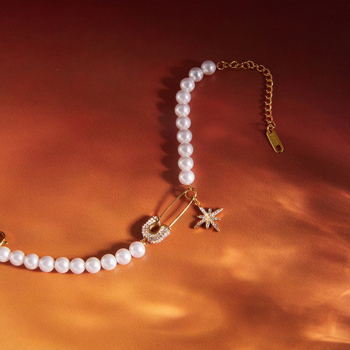 White rhinestone star pendant with white rhinestone pin and glass pearl bracelet